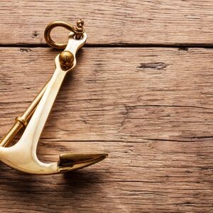 Boat Anchor on Wood Table