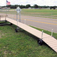 50 Roll in with a 12' x 12' Sundeck with a
7' End Mount Bench