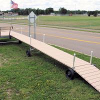 50 Roll in with a 12' x 12' Sundeck with a
7' End Mount Bench