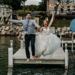 Bride and Groom Jumping off a VDock