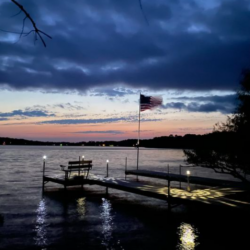 Vdock with Flag Pole under the sunset